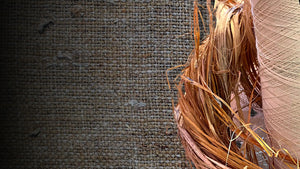 Hemp fibre is displayed with processed fibre inside a jute bag